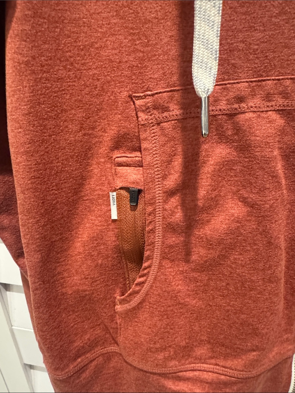 Vuori Halo Performance Zip Hoodie in Rust Orange, soft fabric. No fabric tag. - Picture 4 of 10